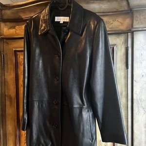 This is a beautiful black leather Liz Claiborne jacket. Used.